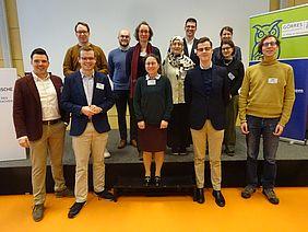 Gruppenbild von Teilnehmenden an einem wissenschaftlichen Kolloquium